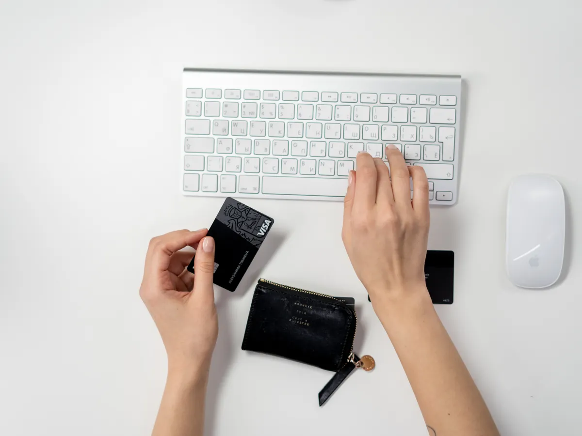 Person paying by card during an online checkout, representing secure eCommerce payments