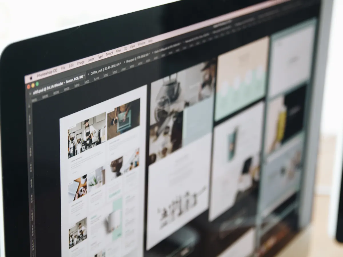 Website page layouts being designed on screen, built to convert visitors into enquiries