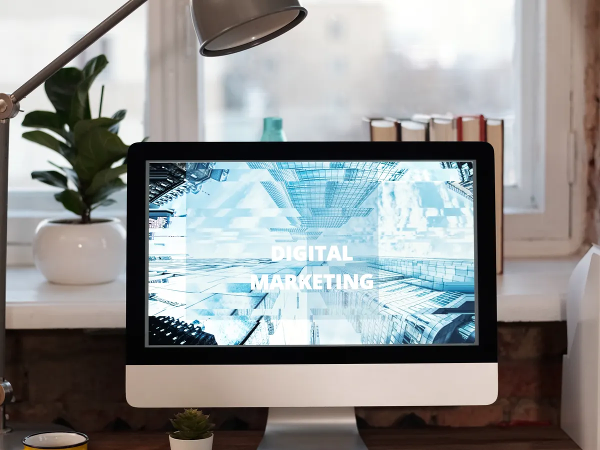 Digital marketing dashboard displayed on a desktop screen in a home office
